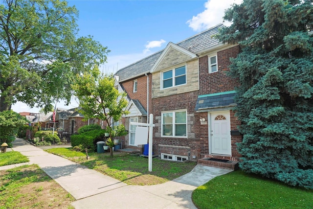 64-18 84th Pl, Middle Village, NY 11379 - multi unit property featuring a high end roof, a front yard, and brick siding