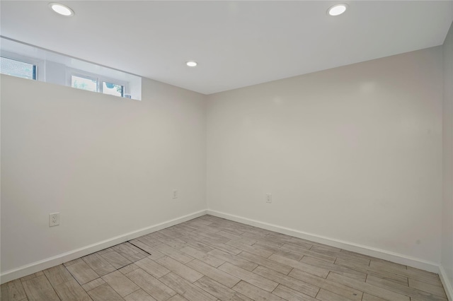 64-18 84th Pl, Middle Village, NY 11379 - empty room featuring recessed lighting and light wood finished floors