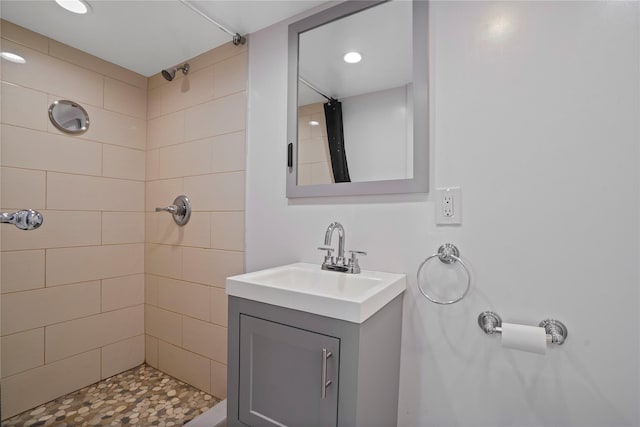 64-18 84th Pl, Middle Village, NY 11379 - bathroom featuring a tile shower, vanity, and recessed lighting