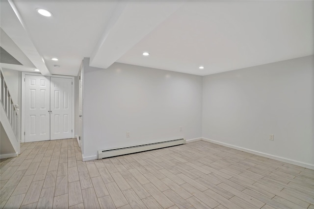 64-18 84th Pl, Middle Village, NY 11379 - finished basement with baseboard heating, recessed lighting, light wood-type flooring, and stairway