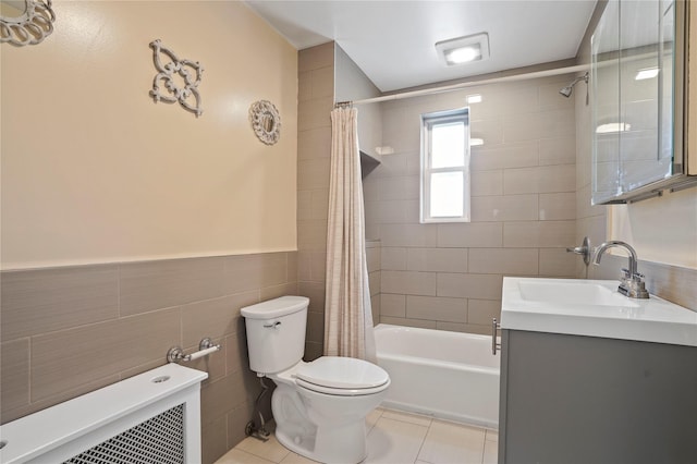 64-18 84th Pl, Middle Village, NY 11379 - full bathroom with tile walls, vanity, shower / bath combo with shower curtain, tile patterned floors, and wainscoting