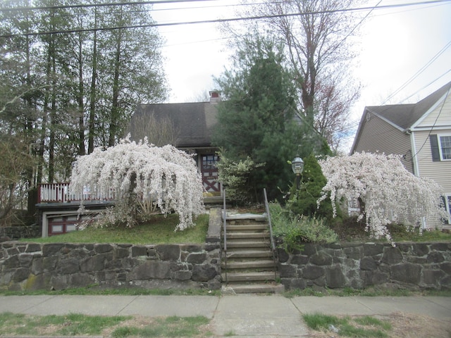 739 Lindbergh Ave, Peekskill, NY 10566 - view of front facade featuring a chimney and stairway