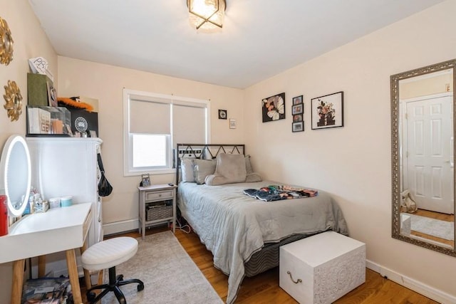 bedroom featuring hardwood / wood-style flooring