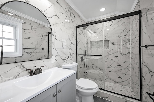 bathroom with crown molding, a shower with shower door, vanity, and toilet