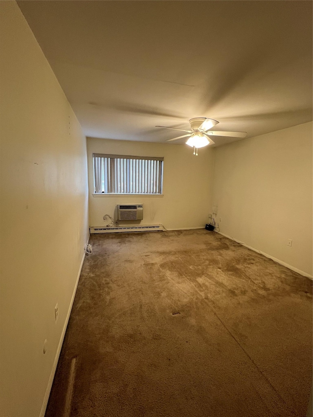 spare room with an AC wall unit, carpet flooring, and ceiling fan