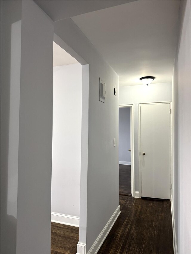 143-50 Hoover Ave Unit 204, Briarwood, NY 11435 - hall featuring baseboards and wood finished floors