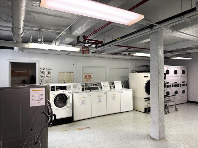 143-50 Hoover Ave Unit 204, Briarwood, NY 11435 - common laundry area featuring tile patterned floors, washing machine and dryer, and stacked washing maching and dryer