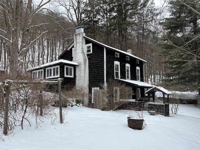 view of snow covered property