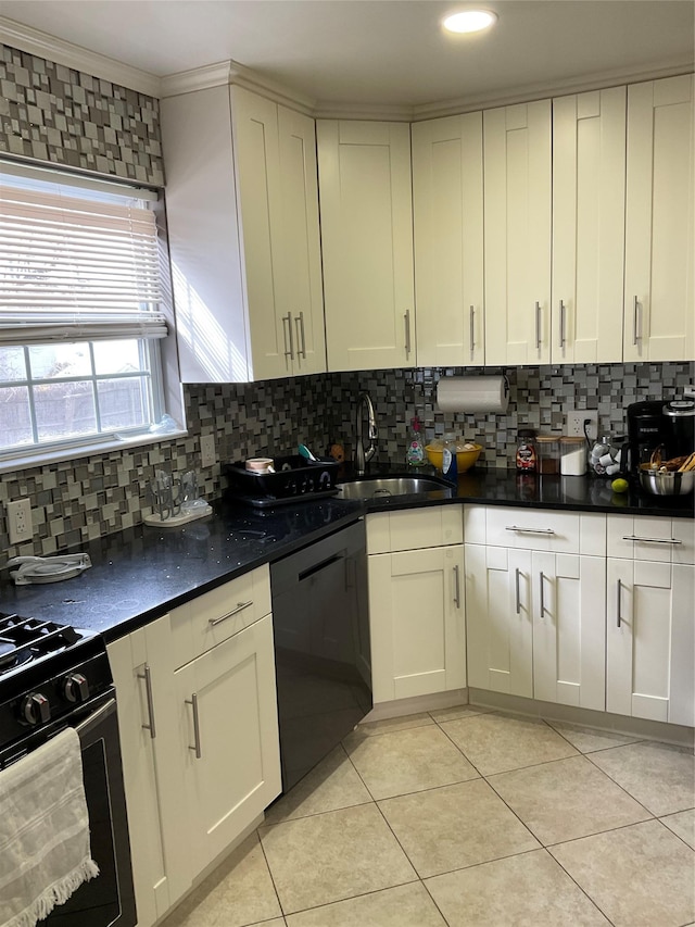 kitchen with tasteful backsplash, black dishwasher, sink, stove, and light tile patterned floors