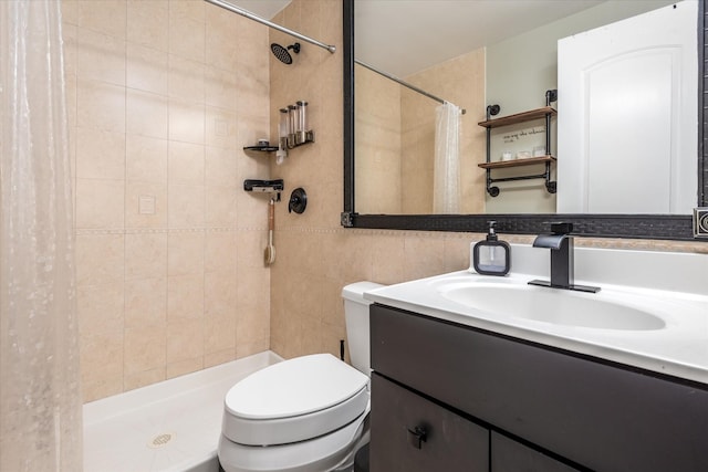 bathroom with vanity, curtained shower, and toilet