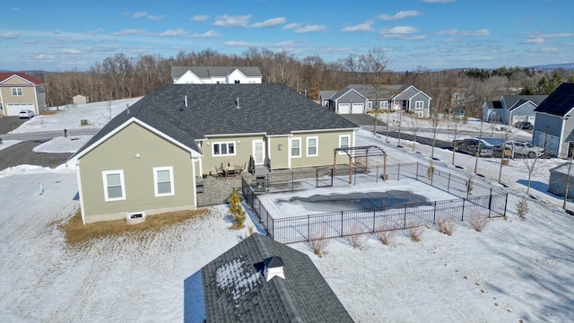 view of snow covered house