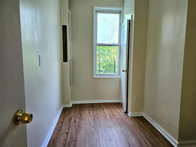 unfurnished room featuring hardwood / wood-style floors