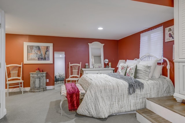 bedroom with light carpet