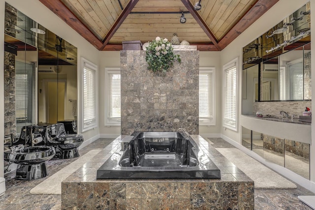 121 Laurel Ln, Laurel Hollow, NY 11791 - bathroom featuring wooden ceiling, vaulted ceiling, baseboards, stone tile floors, and an AC wall unit
