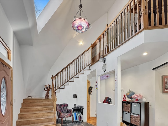 entryway featuring a high ceiling