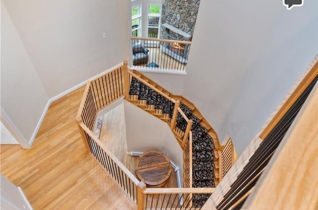 staircase featuring hardwood / wood-style flooring