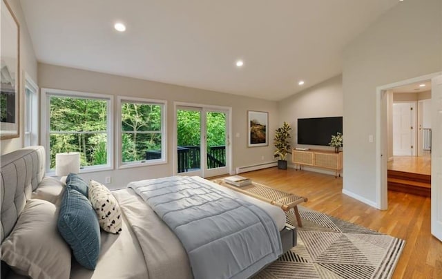 bedroom featuring baseboard heating, lofted ceiling, light wood-type flooring, and access to outside