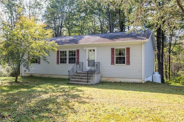 view of front of house with a front lawn