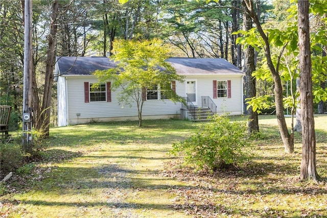 view of front of home with a front yard