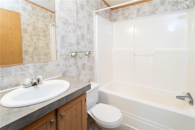 full bathroom featuring shower / tub combination, vanity, and toilet