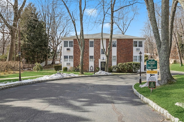 exterior space with curbs and sidewalks