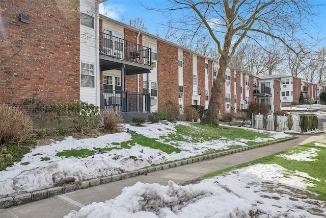 view of snow covered property