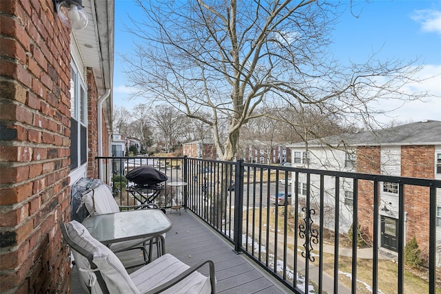 balcony featuring a residential view