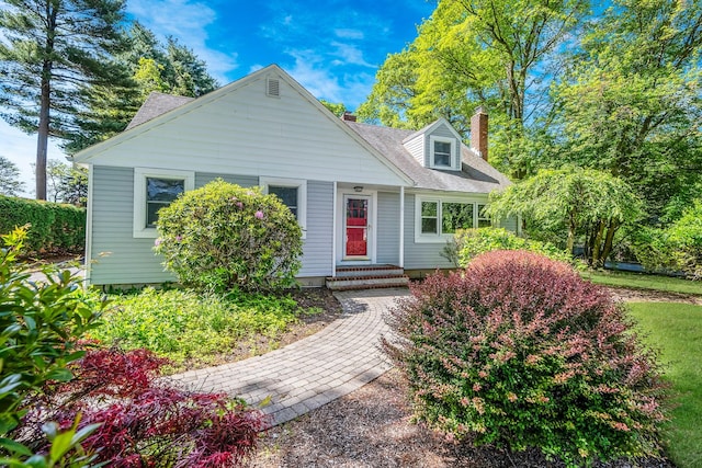 10 Clearbrook Dr, Smithtown, NY 11787 - cape cod home with a chimney and a shingled roof
