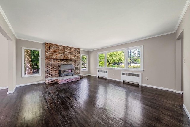 10 Clearbrook Dr, Smithtown, NY 11787 - unfurnished living room with radiator heating unit, dark wood-style flooring, baseboards, and crown molding