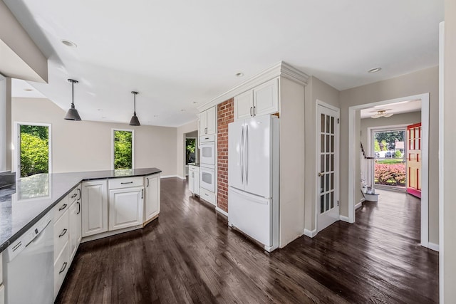 10 Clearbrook Dr, Smithtown, NY 11787 - kitchen with white appliances, dark wood finished floors, white cabinetry, decorative light fixtures, and recessed lighting