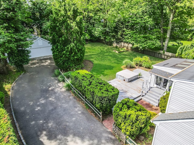 10 Clearbrook Dr, Smithtown, NY 11787 - view of yard featuring an outbuilding, a garage, and a deck