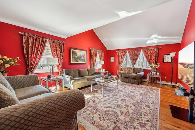 living room with vaulted ceiling and hardwood / wood-style floors