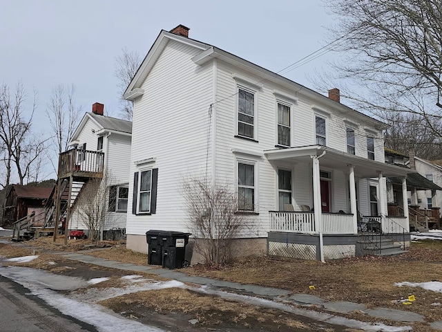 view of home's exterior with covered porch