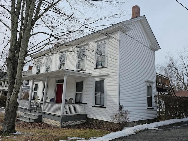 view of front of property featuring covered porch