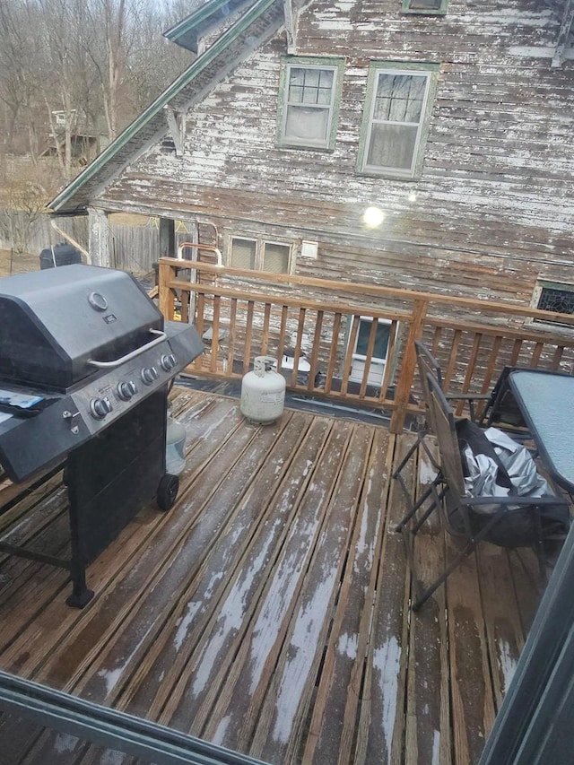 deck featuring a grill