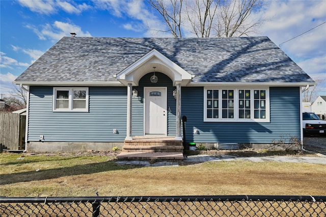 view of front of home featuring a front lawn