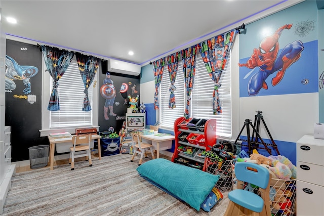 game room with a wall mounted air conditioner