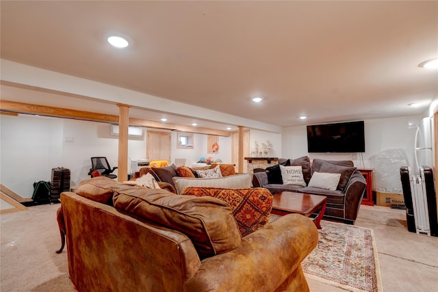 living room with light carpet and a wall mounted air conditioner