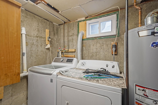 laundry room featuring independent washer and dryer and water heater