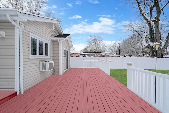 deck with a wall unit AC