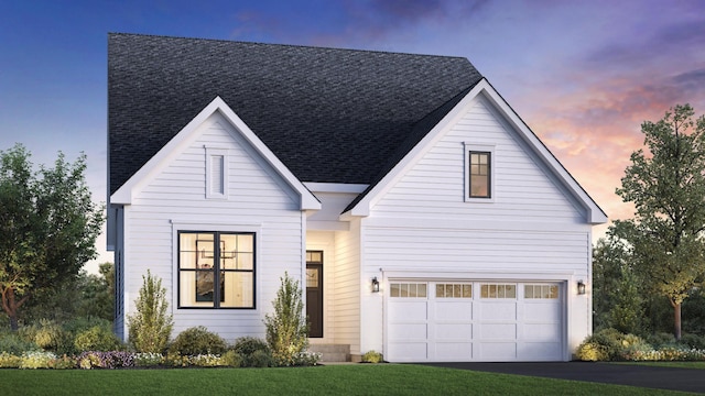 modern farmhouse style home featuring aphalt driveway, a front lawn, a shingled roof, and a garage