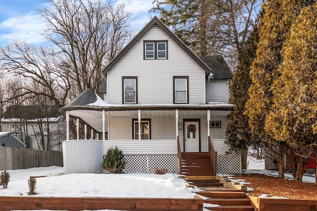 view of front of property featuring covered porch