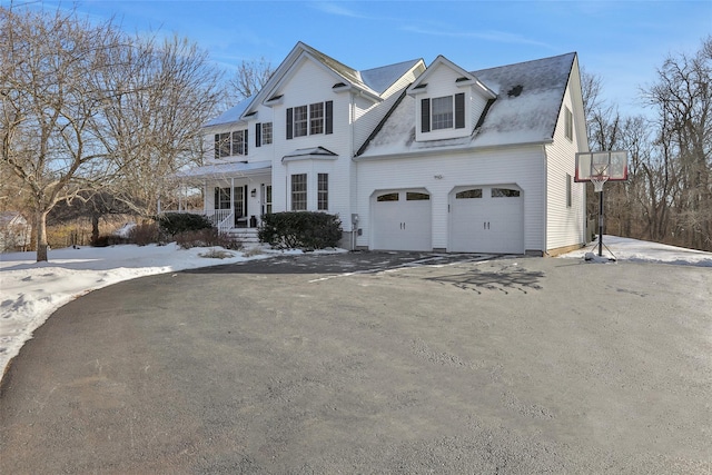 front of property with a garage