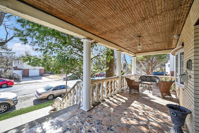 view of patio featuring a porch