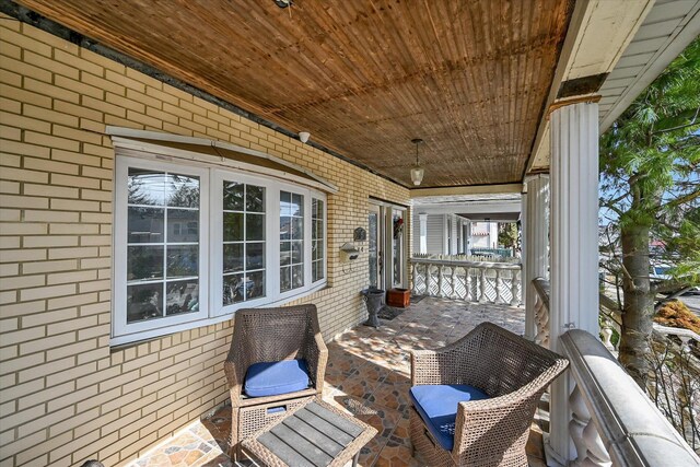 view of patio / terrace featuring a balcony