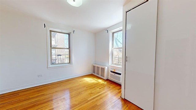 unfurnished room featuring light wood-type flooring