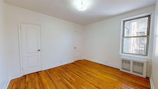 spare room with light wood-type flooring