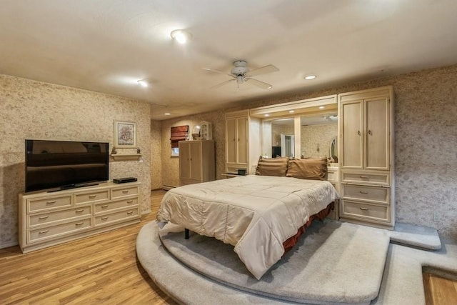 bedroom with light hardwood / wood-style flooring