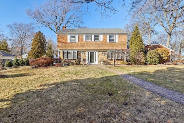 view of front of house featuring a front lawn