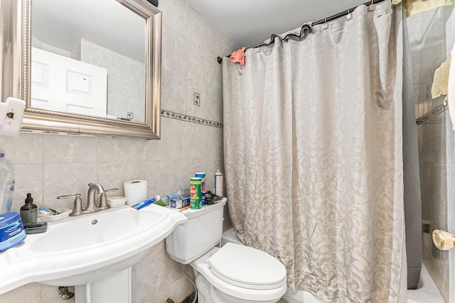 full bathroom featuring toilet, sink, tasteful backsplash, tile walls, and shower / bath combination with curtain